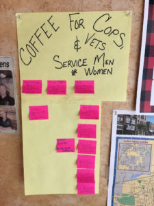 This poster at Courthouse Cafe offers you the opportunity to purchase a coffee to reserve for a serviceman.