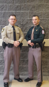 Creek County Sheriff's Deputy John Arnold, left, stands next to his brother Randal, an officer on the Sapulpa Police Department