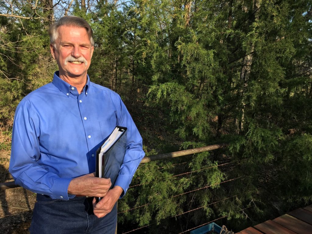 Chuck Threadgill, with his binder documenting a 10-year battle with ODEQ.